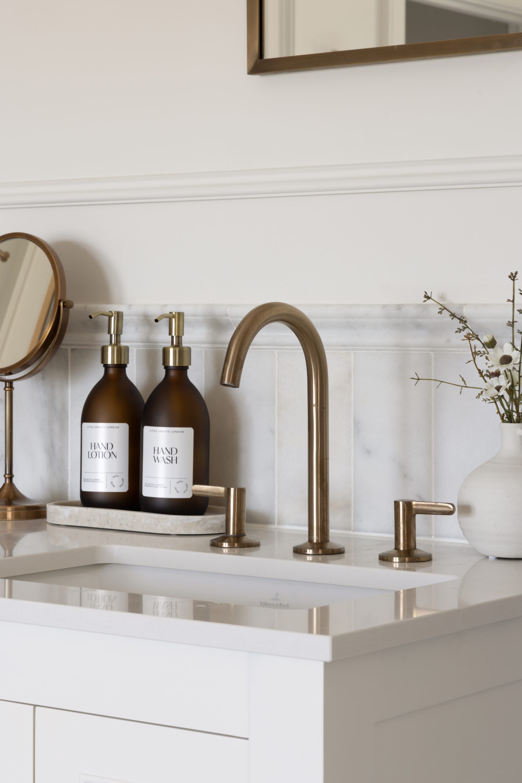 Marble sink basin with brass brushed tap unit