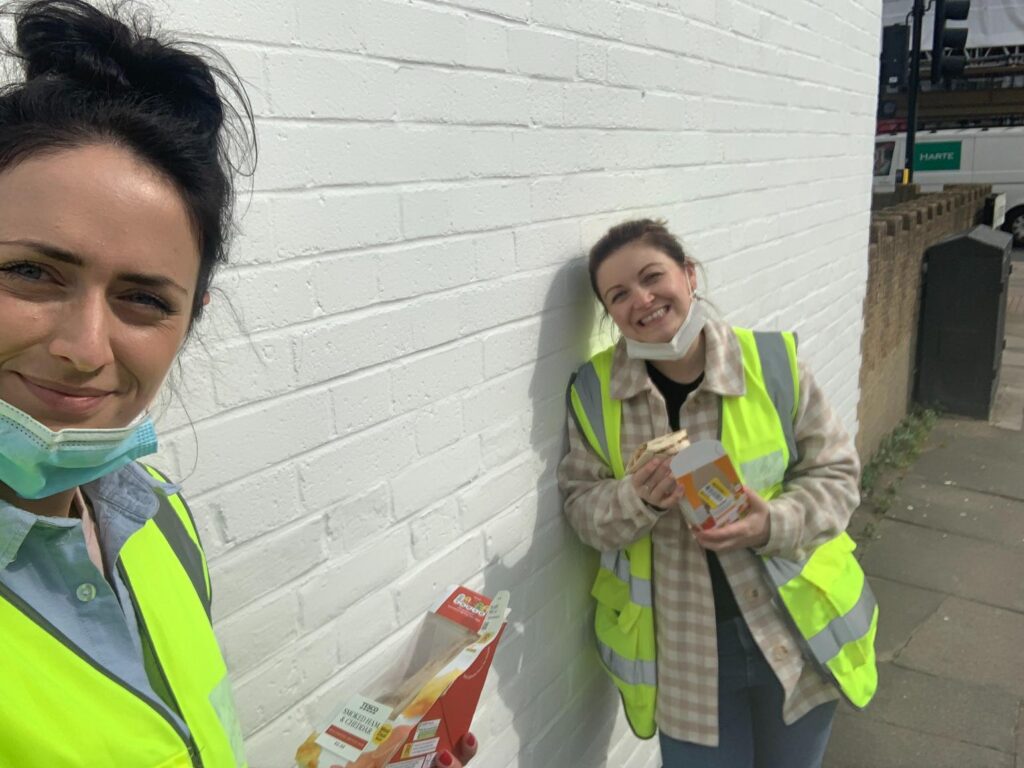 wells and maguire team work with high vis vests on